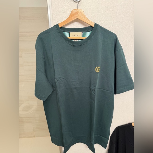 Gucci Dark Green Tee with Gold Emblem
